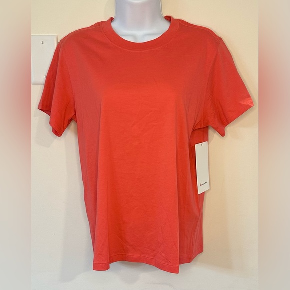 Lululemon Women’s Coral/Pink All Yours Tee NWT Size 2 - Picture 1 of 8